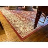 A fine quality Indian deep pile wool Carpet, with all over floral pattern on an iron red ground