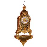 A magnificent late 18th Century French Boulle Bracket Clock, the top surmounted with a gilt bronze