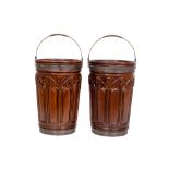 A pair of Gothic Revival style mahogany brass bound Peat Buckets, each with roped brass swing handle