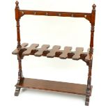 An Edwardian walnut Boot & Crop Stand, with turned supports and shaped legs, 79cms (31"). (1)