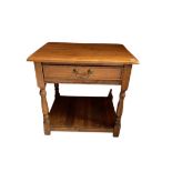 A good rectangular oak Side or Occasional Table, with frieze drawer on turned supports and a