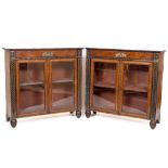 A fine pair of grained rosewood and brass inlaid Pier Cabinets, each frieze with a pair of facing