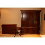 A three drawer mahogany Wardrobe, with six drawer base, 205cms x 173cms (80" x 68"); together with a