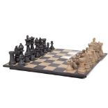 A modern oversized Chess Board, and carved Chess Pieces. (a lot)