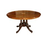 A late Victorian inlaid oval walnut Loo Table, on carved quadruple pod, approx. 117cms long (