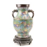 A fine early Japanese cloisonn‚ enamel and bronze two handle Vase, the handles in the form of