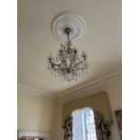 An attractive 8 branch brass mounted glass Chandelier, with festoons of buttons, and lustre drops,