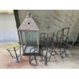 A collection of 9 varied design Wall Mounted Saddle Holders, and a wooden frame Lantern Holder. (10)