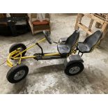A Child's double seat pedal action Go Cart, by BERG, painted yellow. (1)