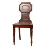 A George IV period mahogany Hall Chair, by Gillows of Lancaster (stamped), stamped also with the