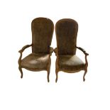 A pair of French style beech high back Armchairs, each with padded back and seat on front cabriole