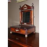 A fine Empire period mahogany Dressing Table Mirror, the secretaire drawer with crested tooled