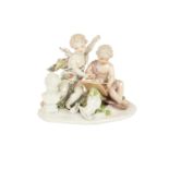 A German porcelain Group, probably Meissen 'Allegory of the Arts,' (some losses), 13cms (5 1/