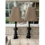 A fine large pair of vase shaped bronzed metal Standard Lamps, each on square stepped base with