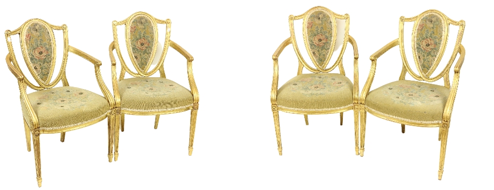 A fine set of four Regency gilt Open Armchairs, in the manner of James Wyatt (1746-1813), each