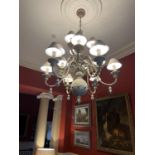 A superb pair of Italian Renaissance style three tier 12 branch Chandeliers, with bulbous terminal