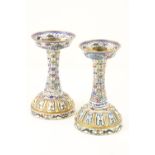 A pair of very unusual Chinese polychrome cloisonn‚ enamel Candlesticks, each with a 15 band stem