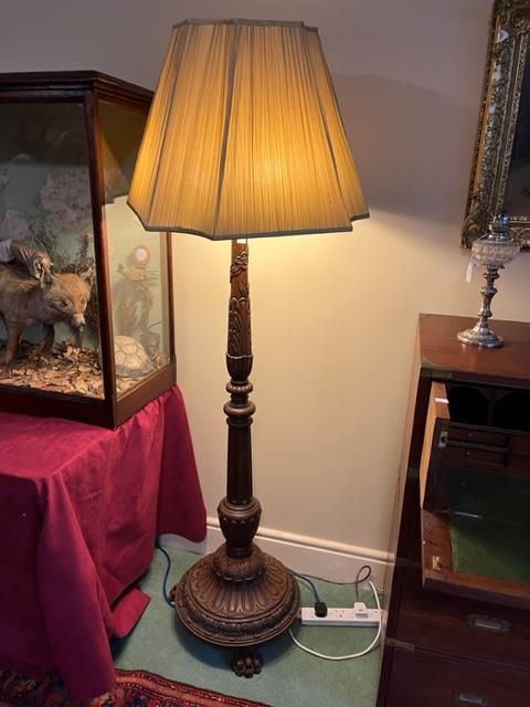 A very attractive Chippendale style mahogany Standard Lamp, with three stage stem carved with leaves