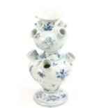 A good Cantagalli blue and white Faience Tulipiere, with nine apertures decorated with figures,