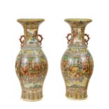 A large pair of Cantonese 'Famille Rose' baluster Vases, Qing Dynasty, 19th Century, each of painted