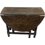 A good 18th Century style oak drop-leaf gate-leg Table, 19th Century, with demi-lune flaps on bead