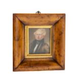 19th Century English School A miniature Portrait of Gentleman wearing a brown jacket with black