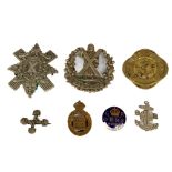 A varied collection of Military Badges, including "The Life Boys," a War Service, The Royal