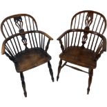 A late 19th Century yew and elm stick back Kitchen Armchair, with arched back and pierced central