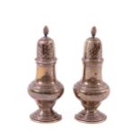 A pair of vase shaped baluster Pepper Castors, London 1938, 130 grms. (2)