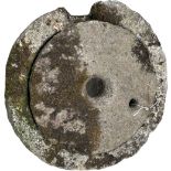 An early carved two piece circular Quern Stone, 61cms (24"). (1)