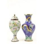 An attractive Chinese cloisonné enamel stemmed Urn and Cover, with floral decoration on a white
