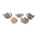 Four various contemporary shaped Yixing clay Teapots and a dark brown moving dragon head dragon
