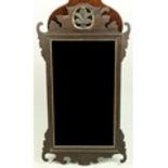 A 19th Century mahogany upright Mirror, with pierced and carved leaf decoration and bevelled mirror,