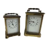 A 19th Century French brass Carriage Clock, 13cms high (5"); and a small similar ditto, 11cms (4 1/