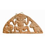 Ethnographical Art:  A 19th Century carved wooden arched Panel, Papua New Guinea, with central