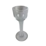 An 18th Century Cordial Glass, with bucket bowl and opaque twist stem on circular solid foot,