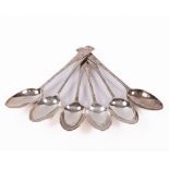 A set of 6 George III Scottish silver taper pattern crested Table Spoons, by R. Green or R.