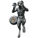 An attractive cast bronzed metal Garden Pool Ornament, modelled as Pan blowing two pipes on circular