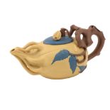 A Chinese yellow clay Buddha's hand Yixing Teapot, with rustic handle, seal mark to base, 18cms (