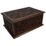 A fine carved Irish mahogany Box, by "The Kilkenny Woodworkers," with fragment of label, the