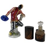 **WITHDRAWN** A good Meissen porcelain Figure of a harlequin holding his Hat and a Beerstein,