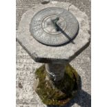 A small composition stone Sundial, with octagonal top and turned stem with metal sundial, 87cms (
