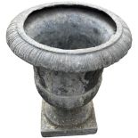 A heavy cast lead campana shaped Garden Urn with classical figures in relief on square stem base,