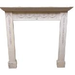 A Georgian style painted pine Fire Surround, the moulded shelf over a dentil moulded edge, the