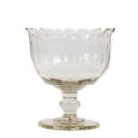 A large late 19th Century cutglass Fruit Bowl, with lobed body and shaped rim on a single knop