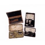 A rectangular silver Bridge Players Box, Chester 1915, 20cms (8"), a cased Christening Set with