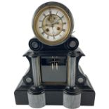 A heavy polished grey and black limestone Mantle Clock, France c. 1900, the movement by J. Marti #