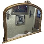 A modern gilt Overmantel Mirror, with a moulded frame and arched top with leaf crest, 90cms x 122cms