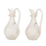 A good pair of late 19th Century frosted glass Water Jugs, each with ice compartment and with spiral