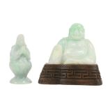 A very good old Chinese light blue carved jade Figure, of the smiling Happy Buddha holding a